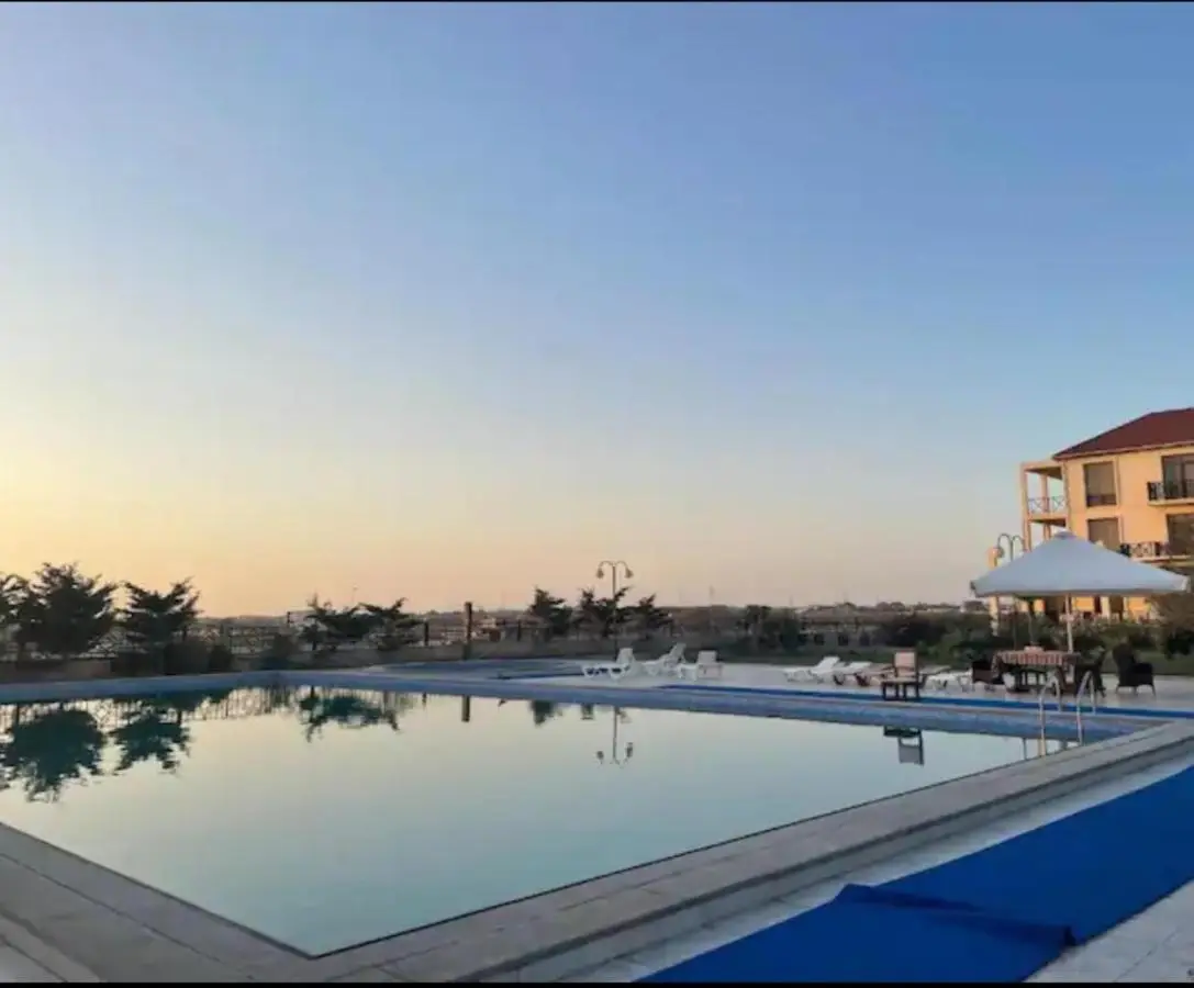 S Pollo Apartments by first beach line