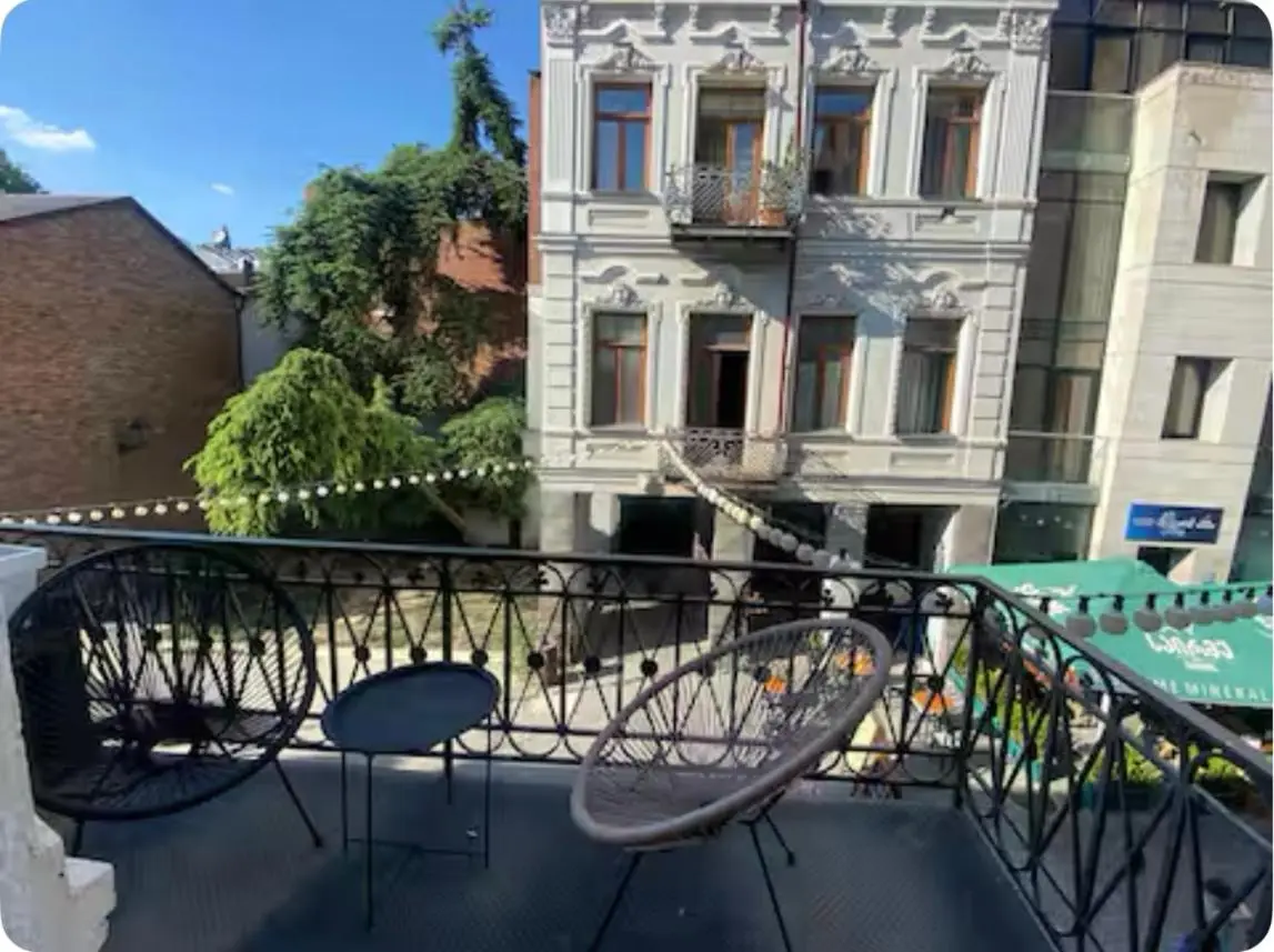 Apartment with a balcony in antique building
