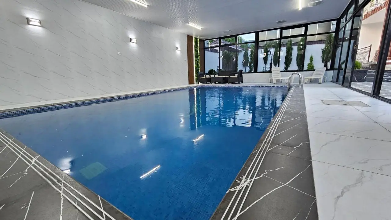 Gabala Milan Villa, indoor heated pool and jacuzzi with garden view