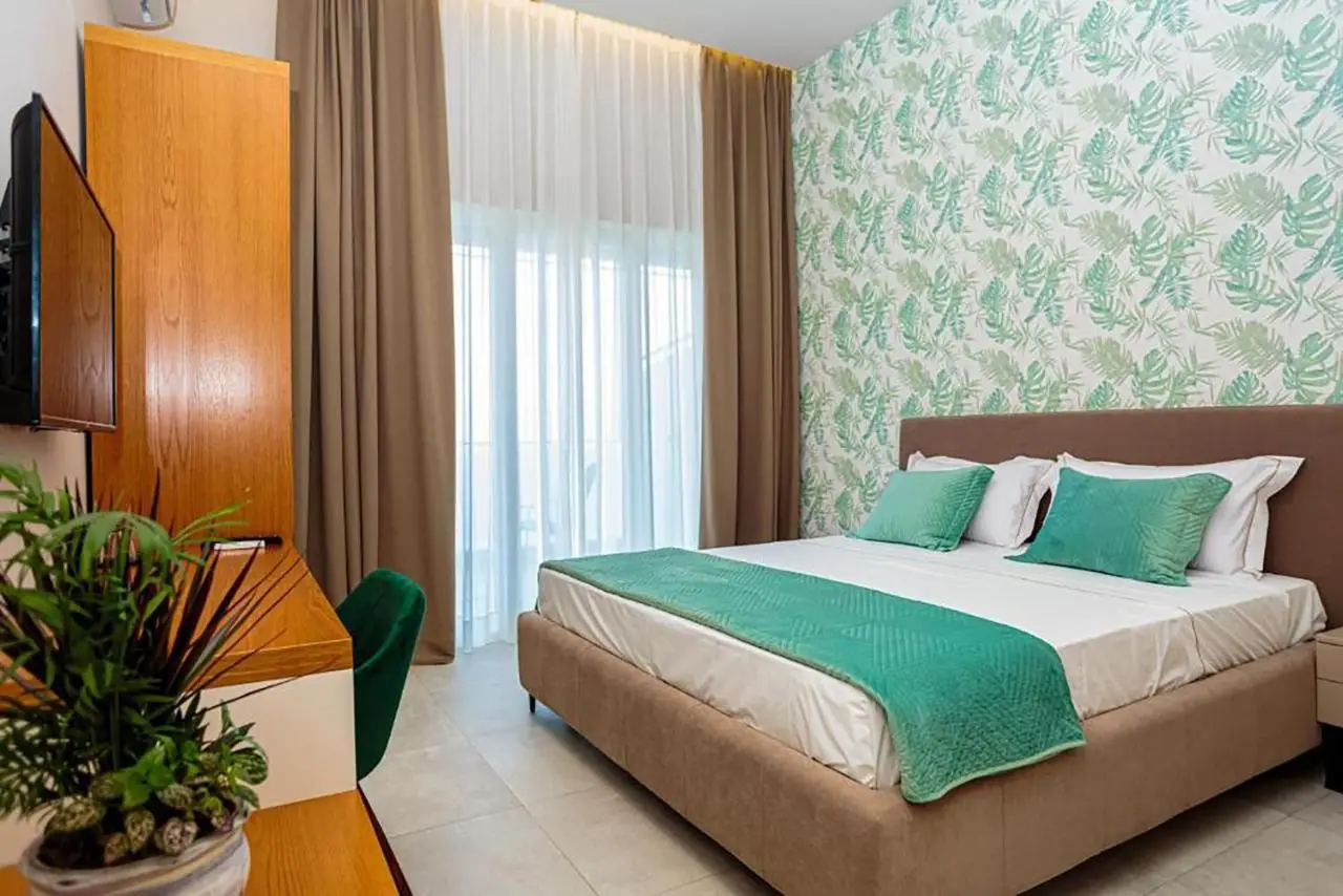 Toto Hotel & Apartments