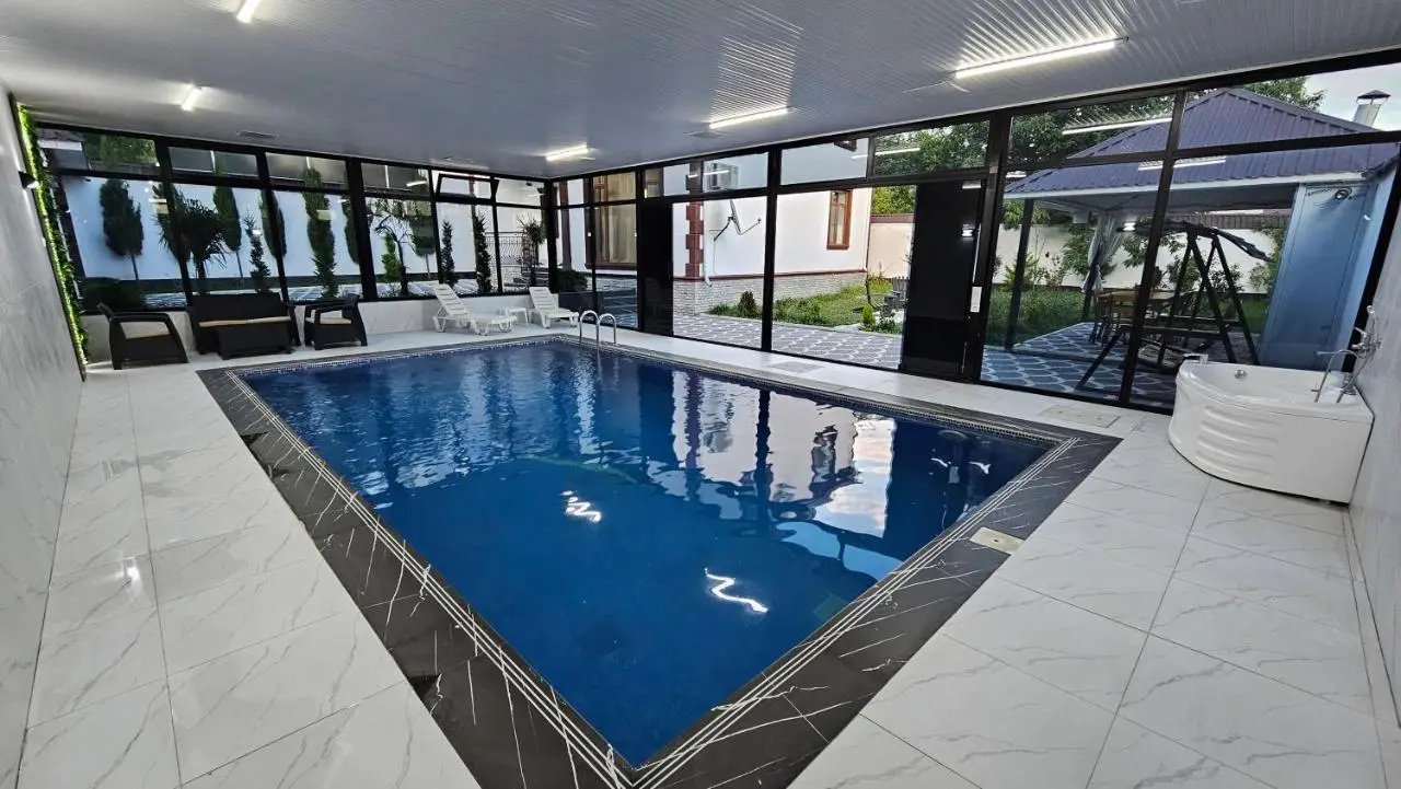 Gabala Milan Villa, indoor heated pool and jacuzzi with garden view