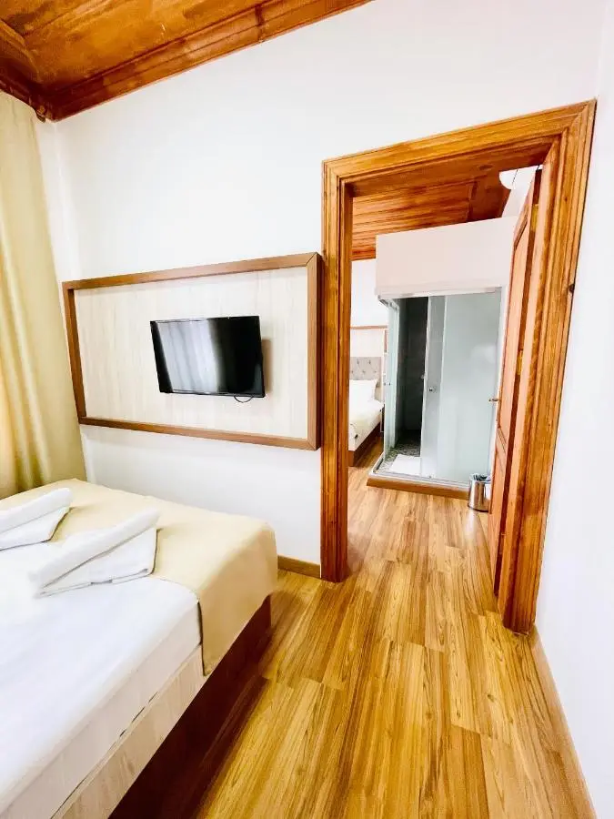 QONAQ HOTEL & SUITES