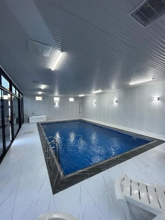 Gabala Milan Villa, indoor heated pool and jacuzzi with garden view