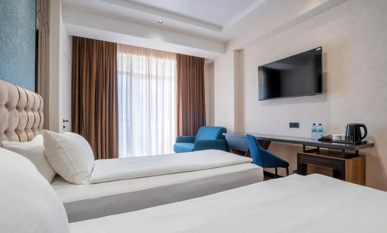 Olympus Hotel By Umbrella