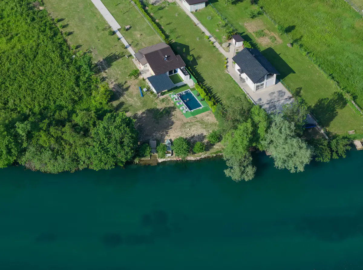 house with yard and beach