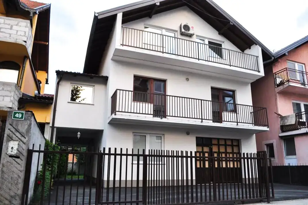 House with tree separate apartments