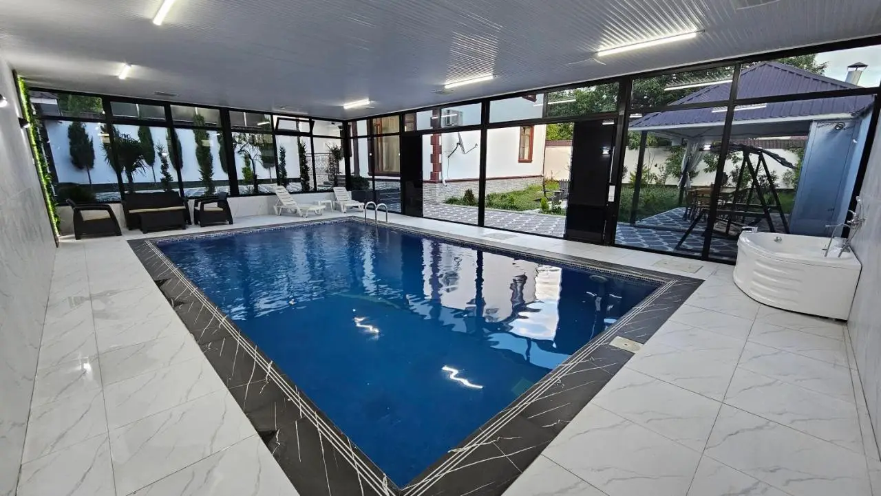 Gabala Milan Villa, indoor heated pool and jacuzzi with garden view