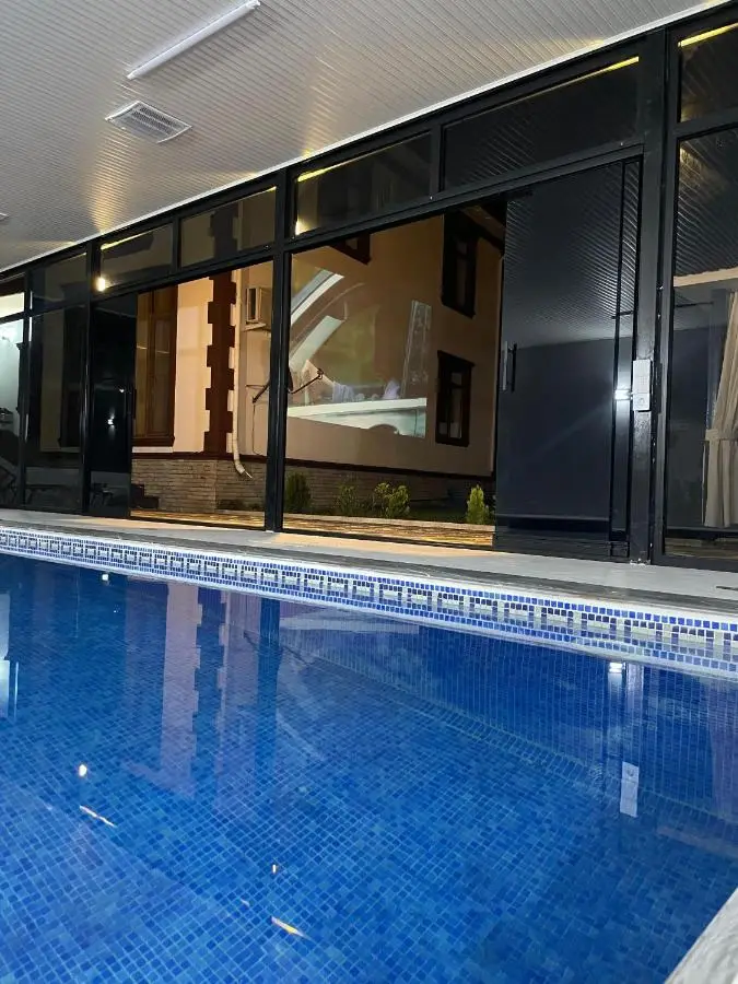 Gabala Milan Villa, indoor heated pool and jacuzzi with garden view