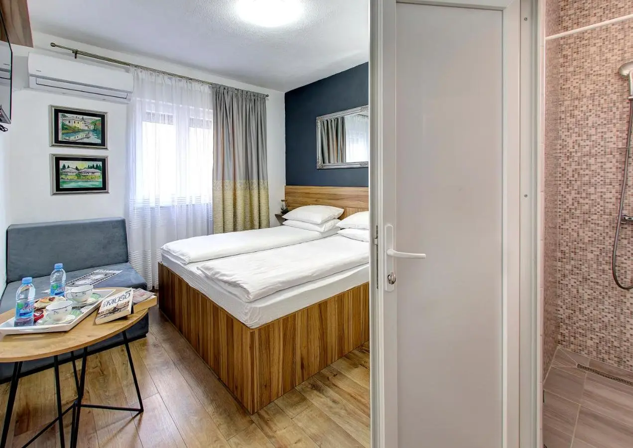 Guesthouse Check In - Apartments & Rooms