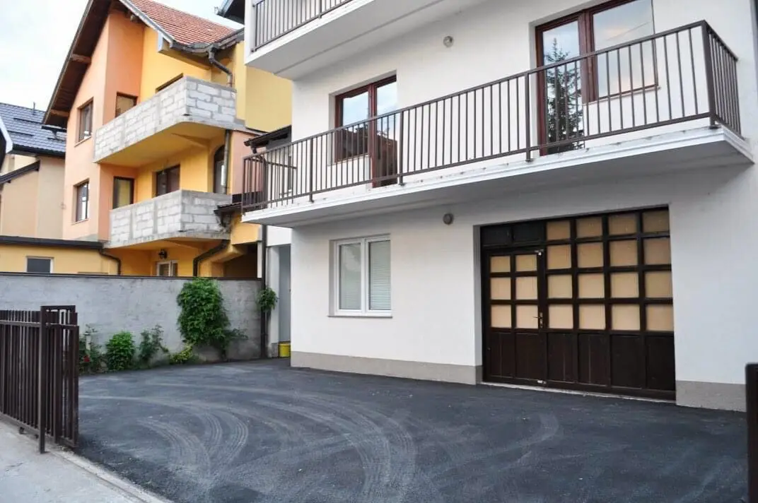 House with tree separate apartments