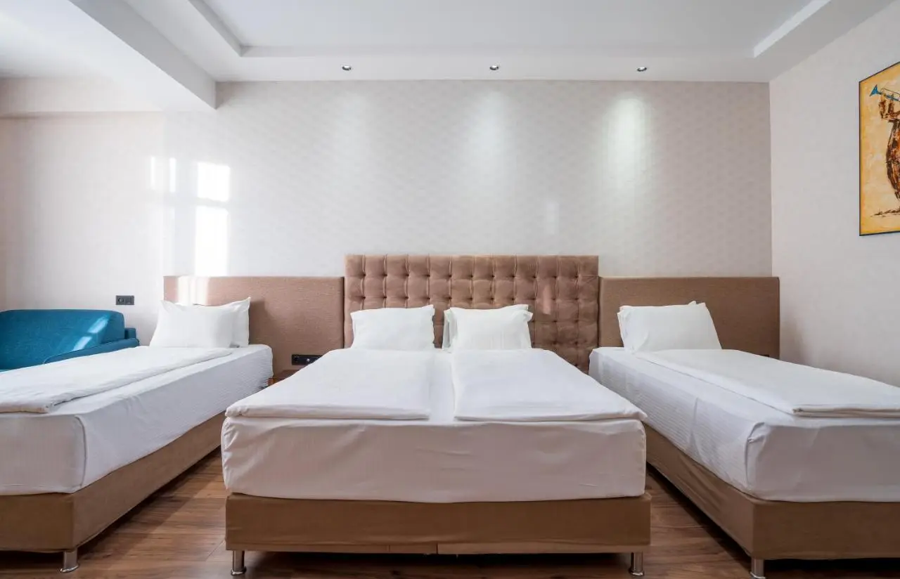 Olympus Hotel By Umbrella