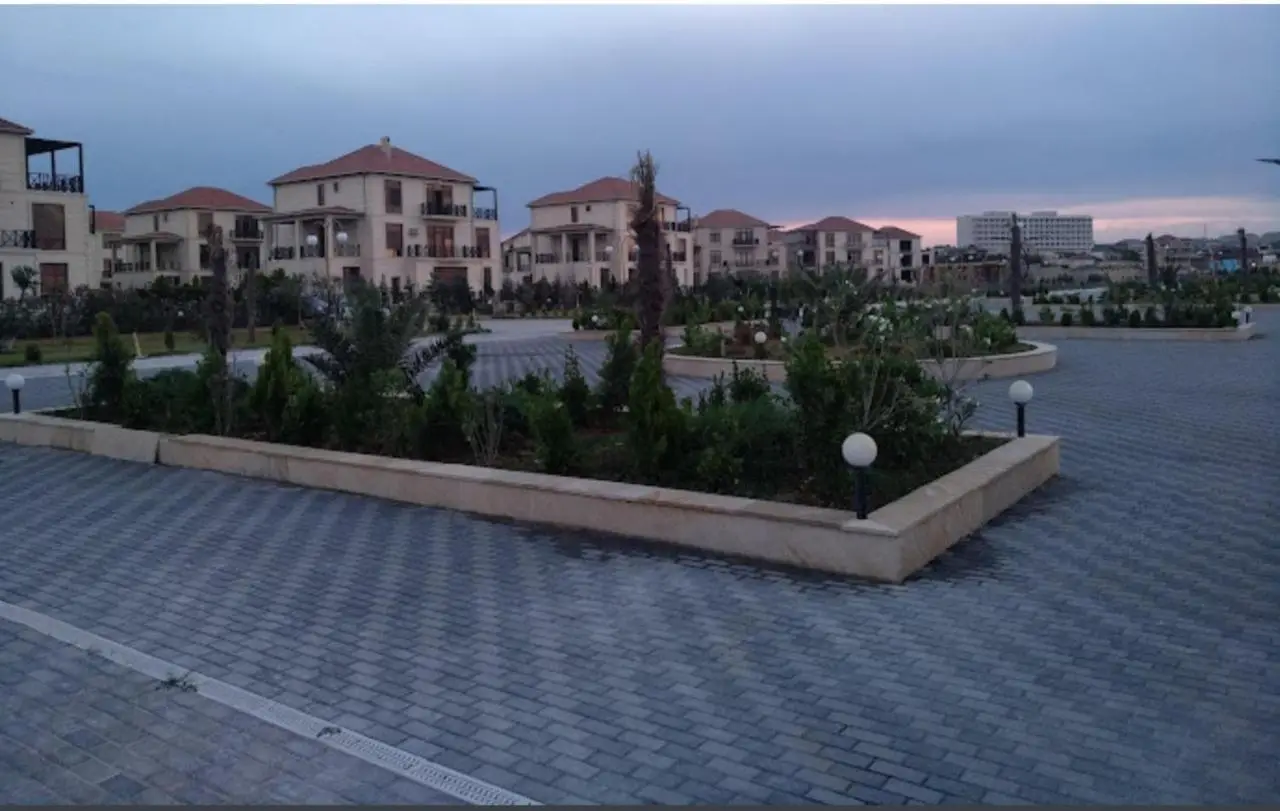 S Pollo Apartments by first beach line