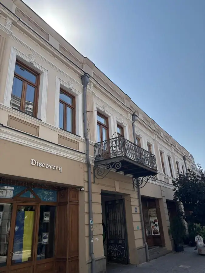 Apartment with a balcony in antique building