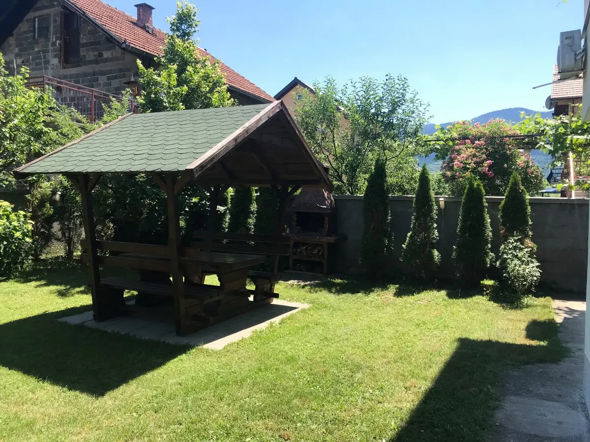 House with tree separate apartments
