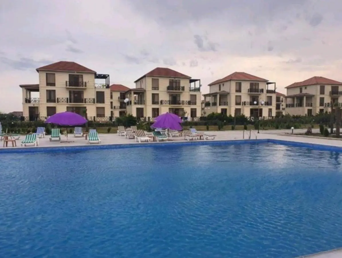S Pollo Apartments by first beach line