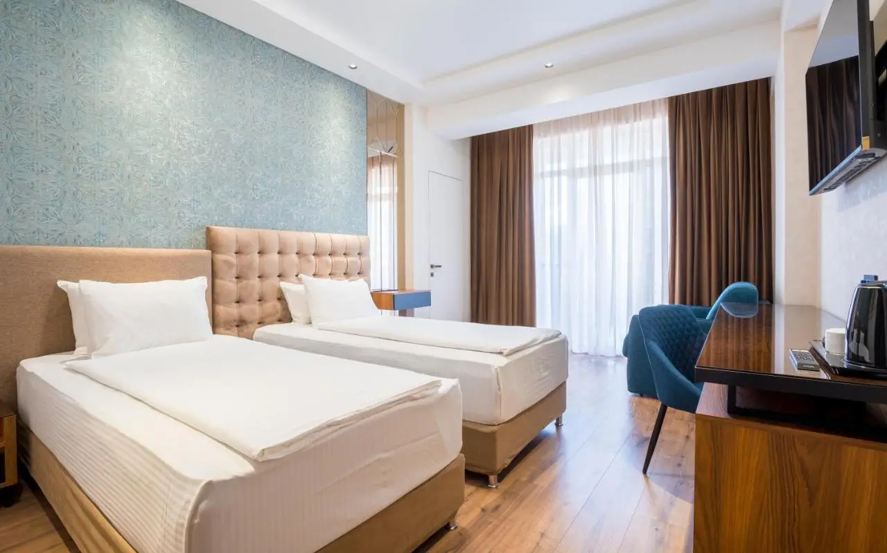 Olympus Hotel By Umbrella