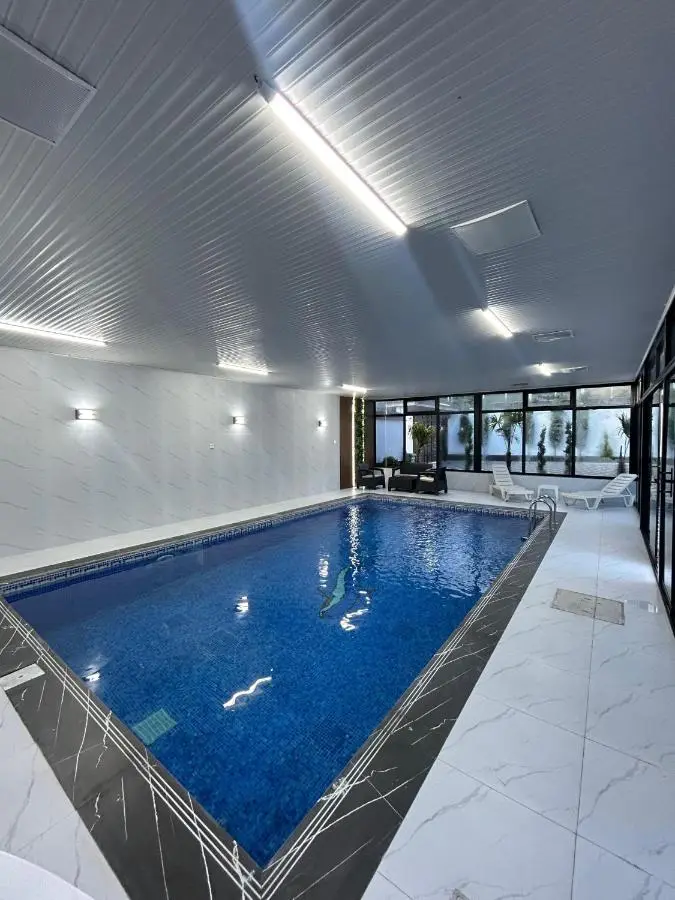 Gabala Milan Villa, indoor heated pool and jacuzzi with garden view
