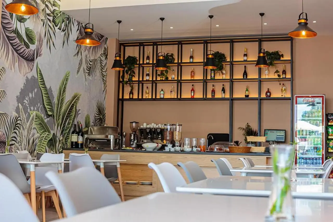 Toto Hotel & Apartments