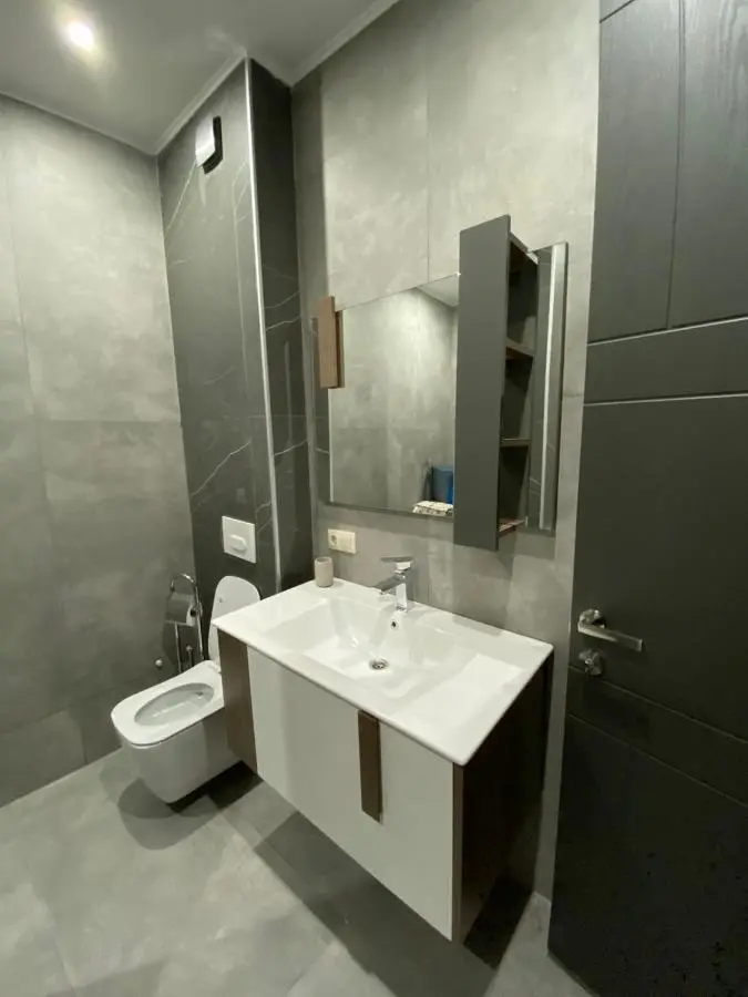 APARTMENT SIXTEEN