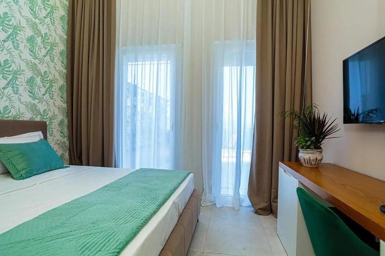 Toto Hotel & Apartments