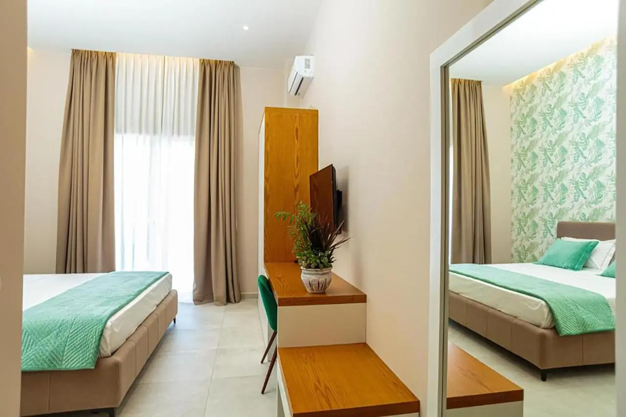 Toto Hotel & Apartments