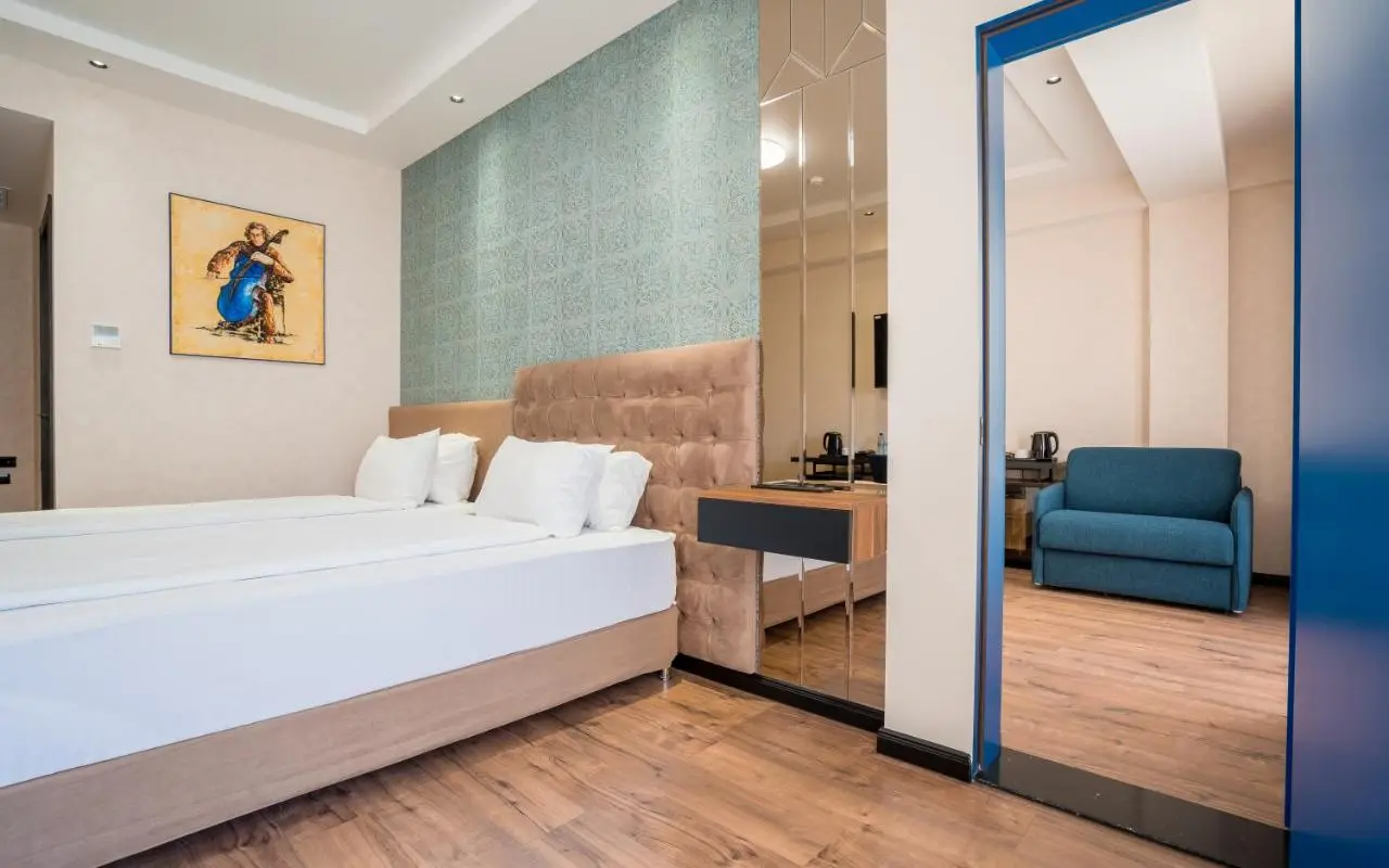 Olympus Hotel By Umbrella